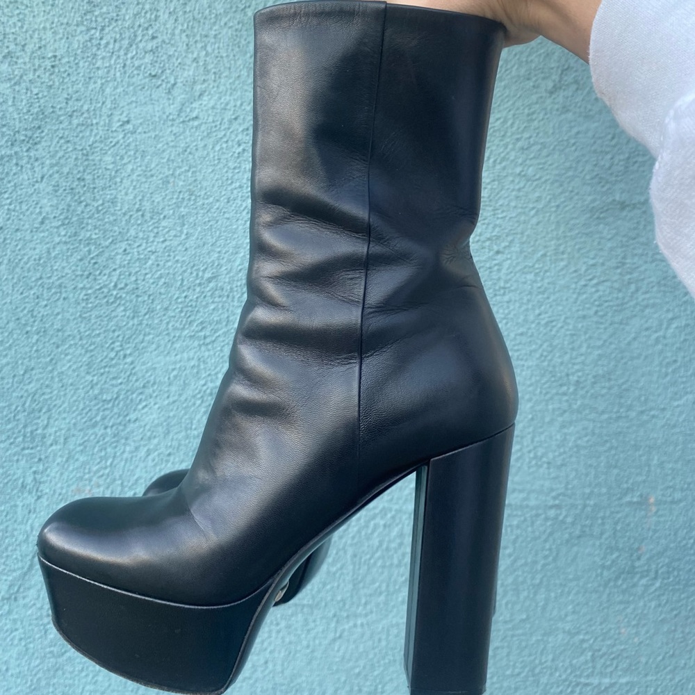 Black platform Gucci boots